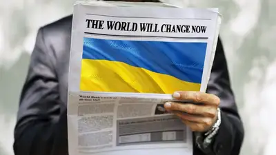 флаг Украины на газете, фото - Новости Zakon.kz от 29.09.2023 22:03