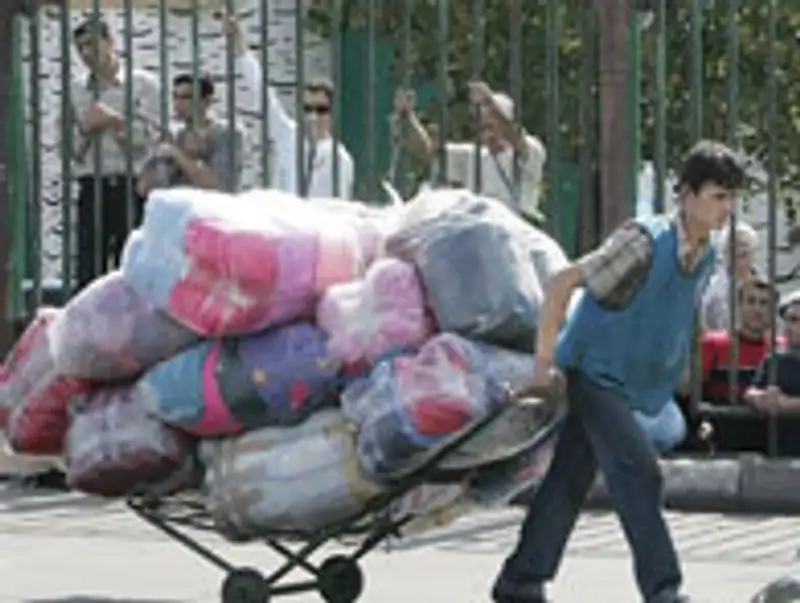 49 работников Центрального вещевого рынка Алматы сегодня утром не дошли до своих рабочих мест, фото - Новости Zakon.kz от 01.12.2011 19:36